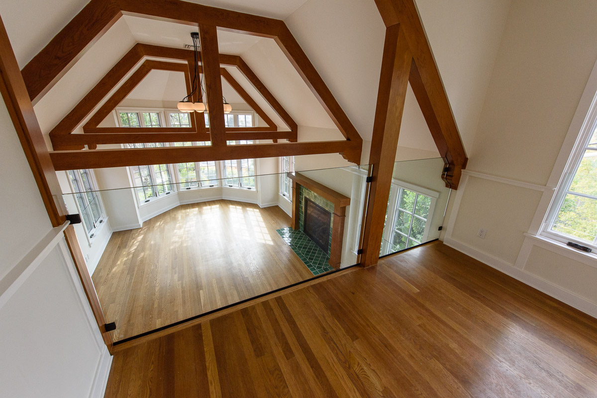  Custom glass guardrail opening up the home 